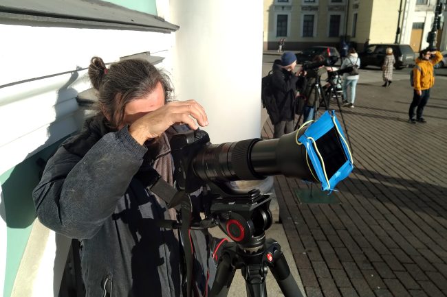 фотограф, телеобъектив, наблюдение солнечного затмения